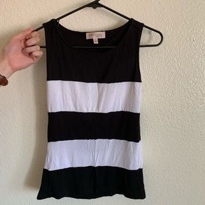 Sleeveless black & white top with draped back
